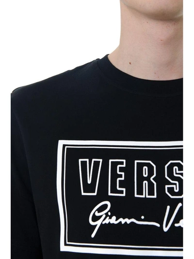 Shop Versus Black Cotton T-shirt With Logo  Gianni Versace