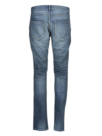 Shop Saint Laurent Distressed Wash Skinny Jeans In Blu