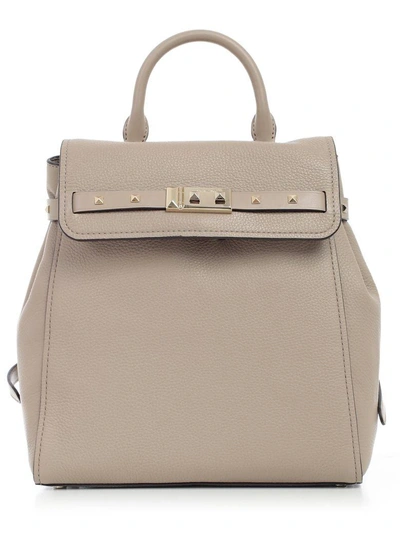 Shop Michael Michael Kors Studded Detail Backpack In Truffle