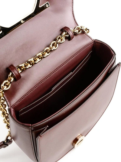 Shop Ferragamo Vela Shoulder Bag In Wine