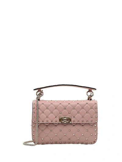 Shop Valentino Rockstud Corssbody Bag In Rosa