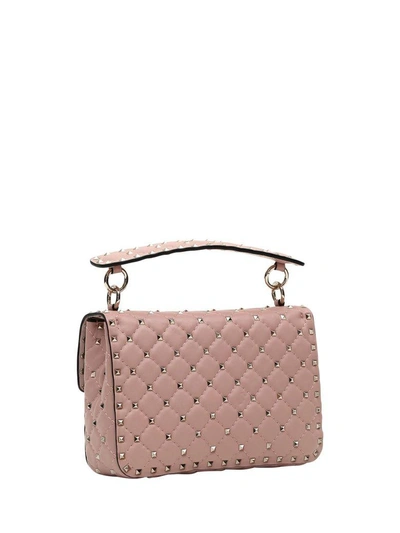 Shop Valentino Rockstud Corssbody Bag In Rosa