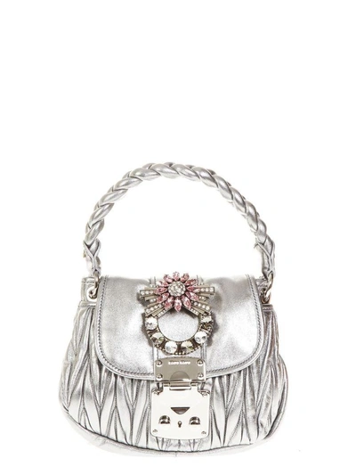 Shop Miu Miu Embellished Metallic Leather Hand Bag In Silver