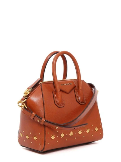 Shop Givenchy Antigona Mini Handbag In Beige