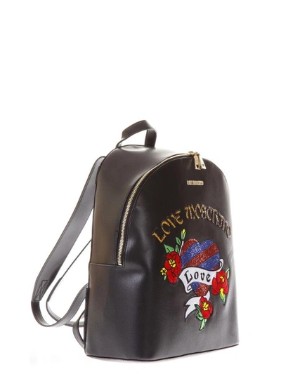 Shop Love Moschino Black Faux Leather Backpack With Heart Pattern