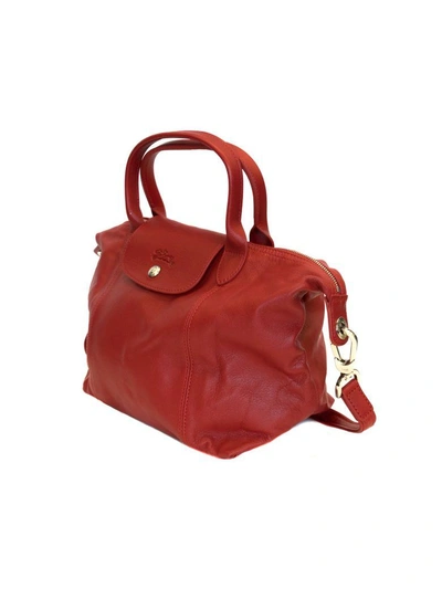 Longchamp - The iconic Le Pliage Cuir bag comes in Cherry
