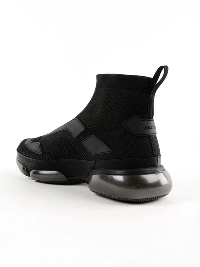 Shop Prada Cloudbust Hi-top Sneakers In Nero+nero
