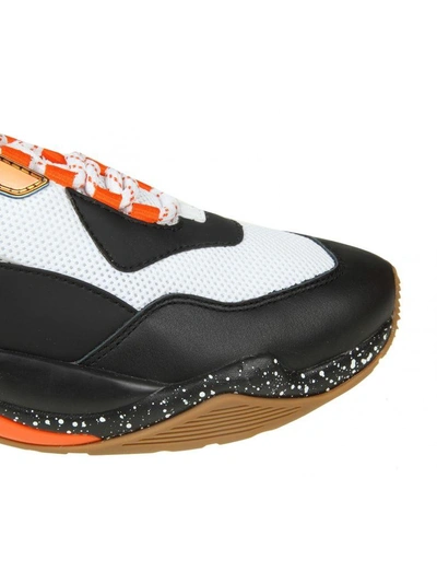 Shop Puma Thunder Elettric"  Sneakers In Black / Orange Leather" In White
