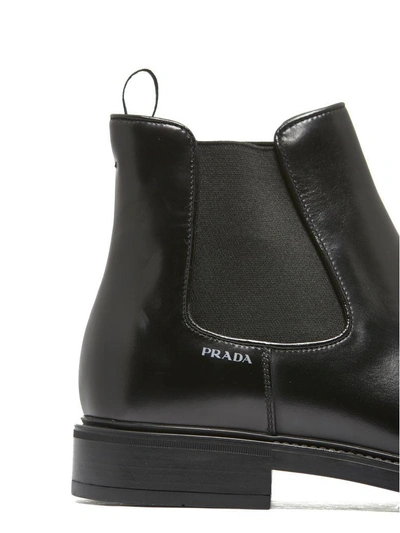 Shop Prada Slip On Ankle Boots In Nero