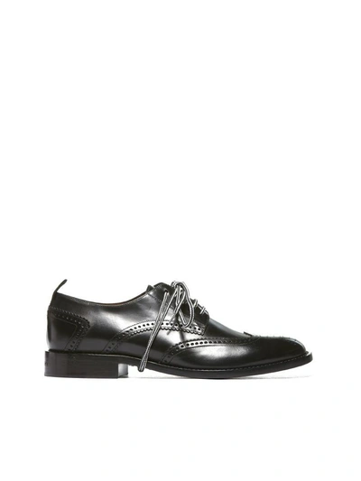 Shop Givenchy Perforated Derby Shoes In Nero