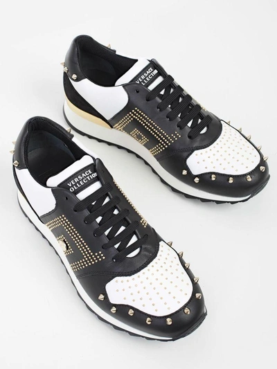 Shop Versace Spike Stud Sneakers In V800h Black White Gold