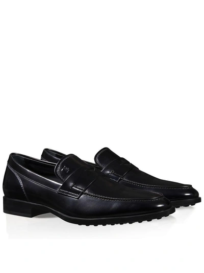 Shop Tod's Penny Loafers In Black