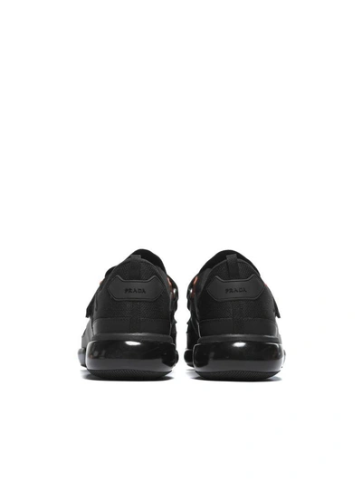 Shop Prada Sport Knit Sneakers In Nero Mandarino