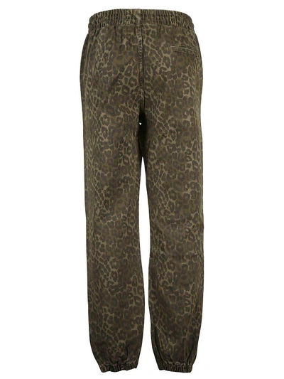Shop Alexander Wang Distressed Track Pants In Sage Leopard Print