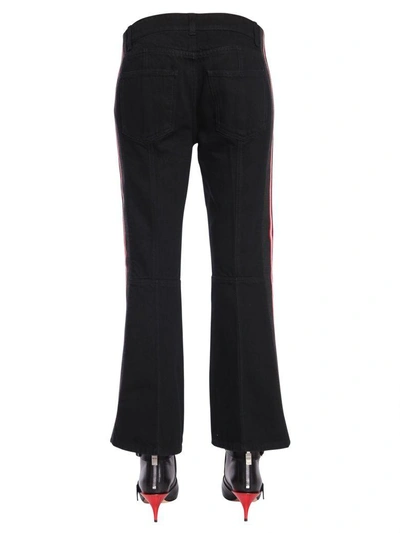 Shop Alexander Mcqueen Kickback Trousers In Nero