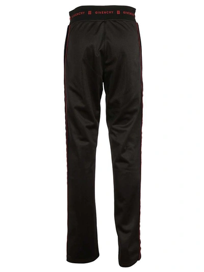 Shop Givenchy Logo Track Pants In Black Red