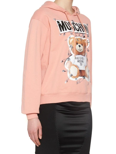 Shop Moschino 'teddy Pin' Hoodie In Pink