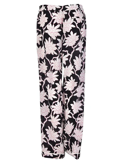 Shop Valentino Popflowers Palazzo Trousers In Nero