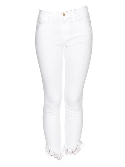 Shop Frame Le High Skinny Jeans In White