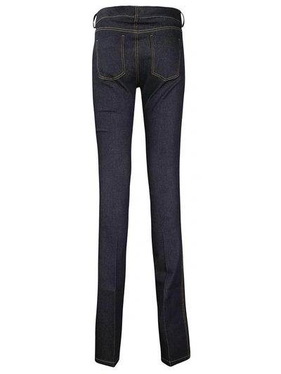 Shop Victoria Beckham Raw Stretch Bootcut Jeans In Deep Indigo