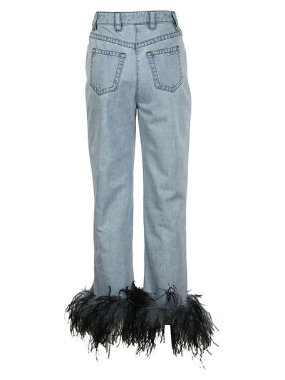 Shop Prada Feather Jeans In F0v3n Light Blue