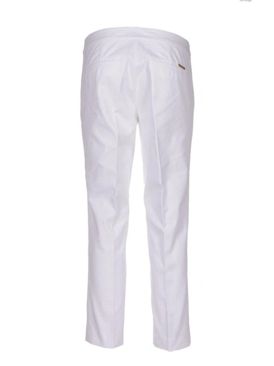 Shop Michael Michael Kors Cropped Slim-fit Trousers In White