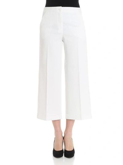 Shop Boutique Moschino Cotton Trousers In White