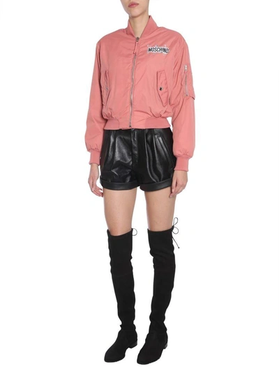 Shop Moschino Cropped Bomber Jacket In Rosa