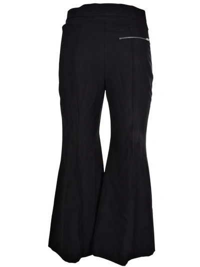 Shop Chloé Flared Trousers In Black