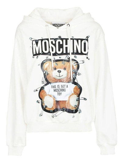 Shop Moschino Teddy Bear Safety Pin Hoodie In White