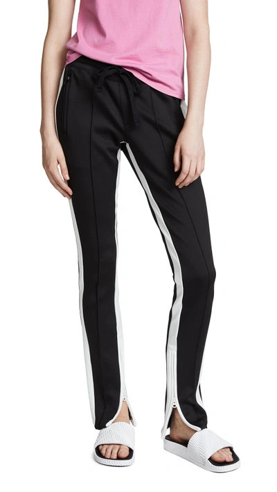 Shop Pam & Gela Low Rise Cigarette Sweatpants In Black