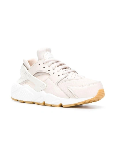 Shop Nike Wmns Air Huarache Run Sneakers In Neutrals