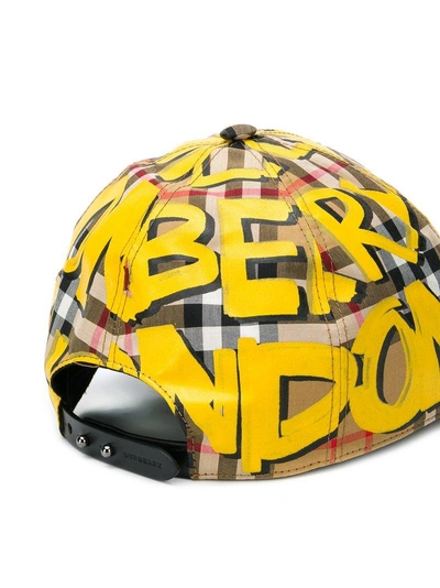 Shop Burberry Graffiti-print Vintage Check Baseball Cap In Yellow