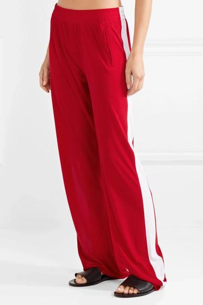 Shop Norma Kamali Striped Jersey Track Pants In Red