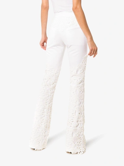 Shop Ronald Van Der Kemp Lace Applique Flared Jeans In White