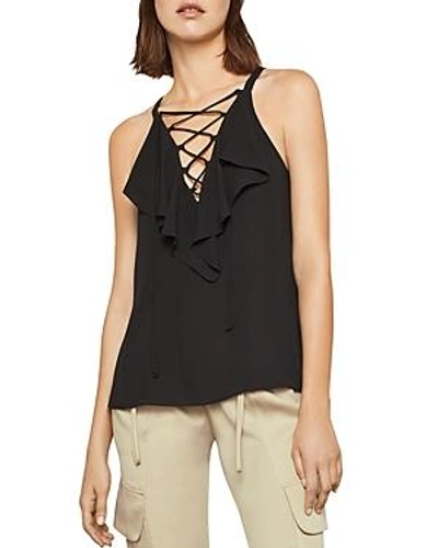 Shop Bcbgmaxazria Ruffled Lace-up Top In Black