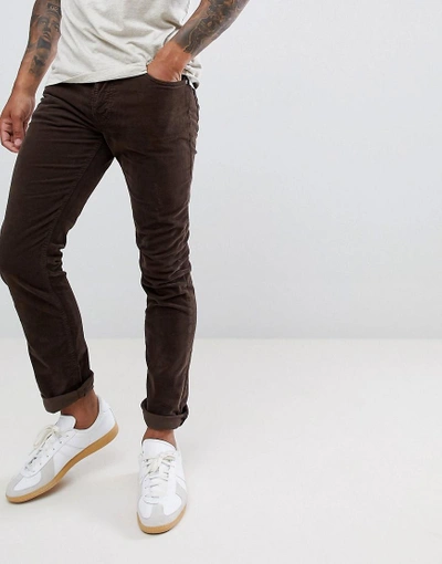 Shop Nudie Jeans Co Grim Tim Slim Pants Velvet Choko - Brown