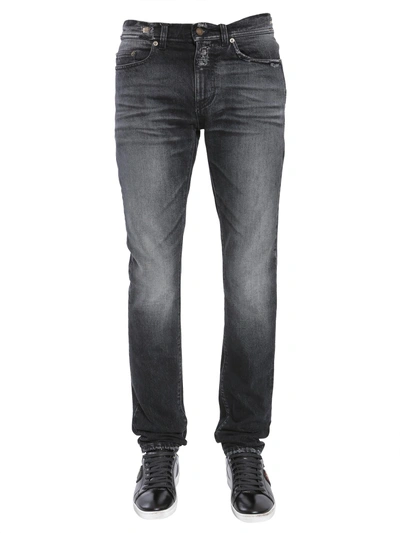 Shop Saint Laurent Low Waisted Original Skinny Jeans In Black