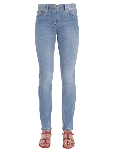 Shop Versace Skinny Fit Jeans In Denim