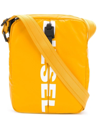 Shop Diesel Logo Cross-body Bag - Yellow