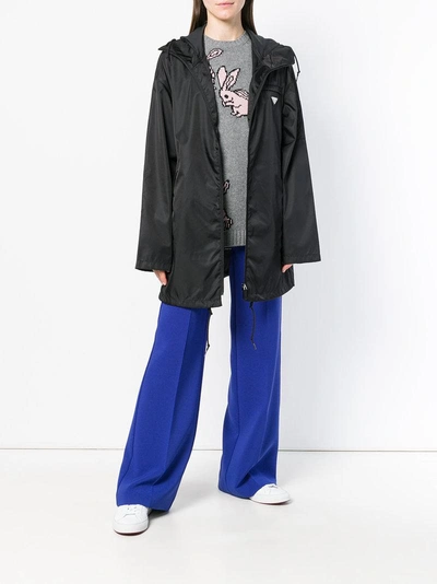 Shop Prada Zipped Up Raincoat - Black