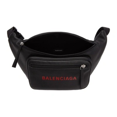 Shop Balenciaga Black Leather Logo Belt Bag In 1064blk/red
