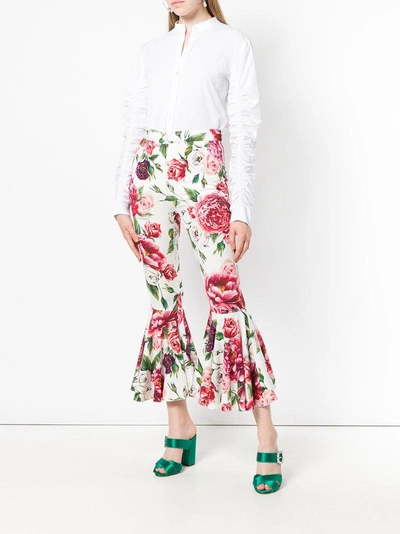 Shop Dolce & Gabbana Peony Print Flared Trousers - White