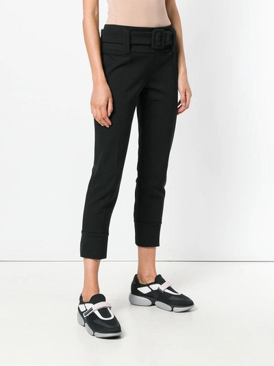 Shop Prada Cropped Belted Skinny Trousers - Black