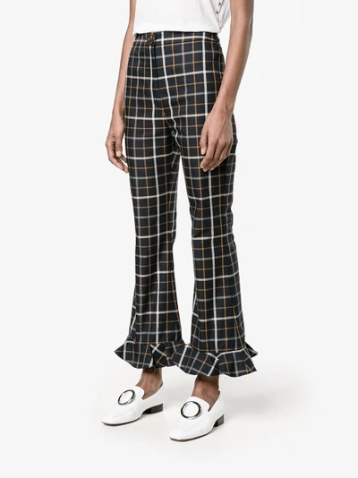 Shop A.w.a.k.e. Checked Ruffle Hem Trousers In Blue