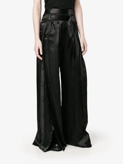 Shop Ann Demeulemeester Flared Trousers In Black