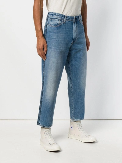 Shop Levi's Draft Tapered Jeans - Blue