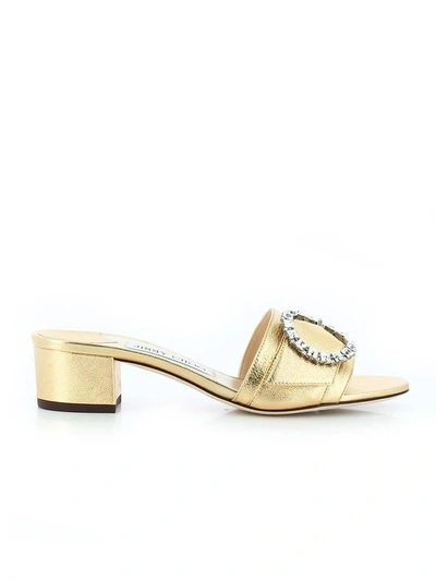 Shop Jimmy Choo Buckled Granger Mules In Gold