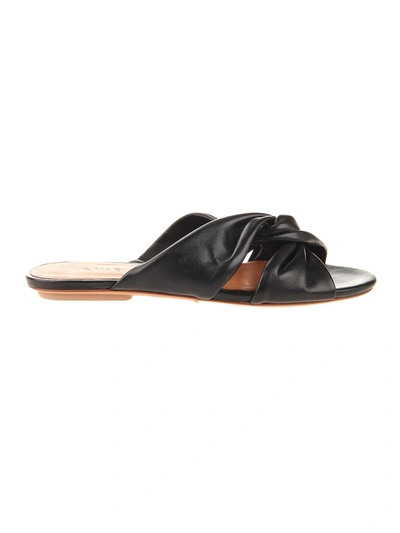 Shop Chie Mihara Knot Slides In Black