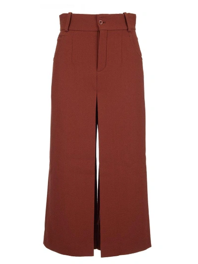 Shop Chloé Cropped Flared Trousers In Red